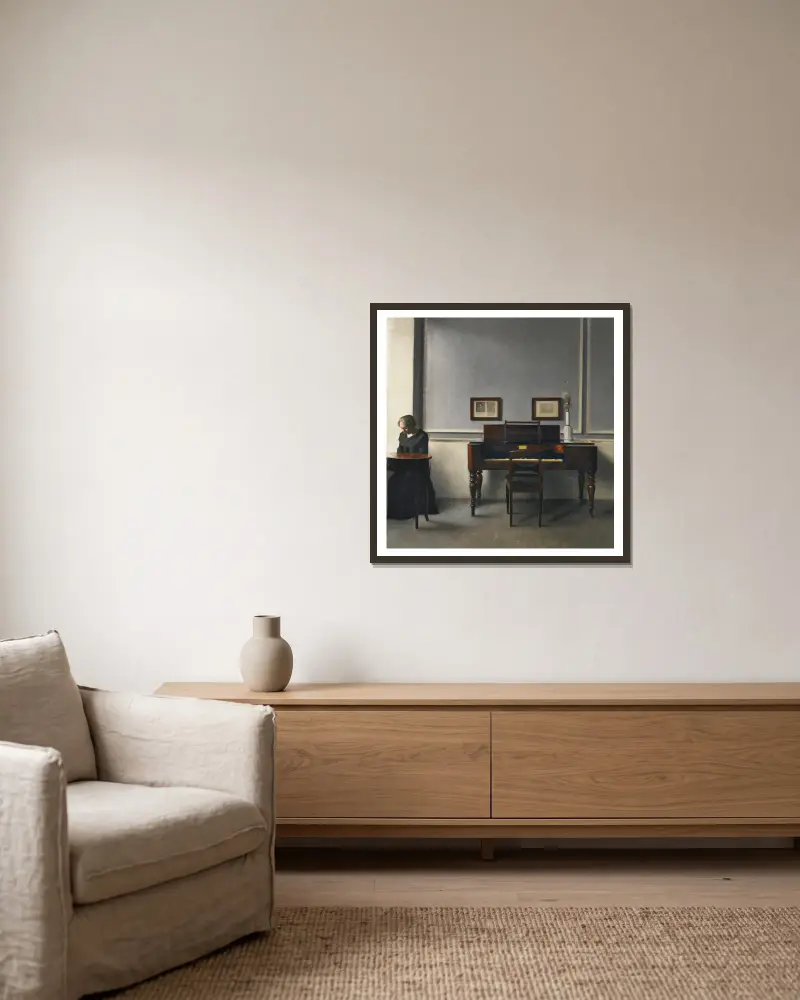 Ida In An Interior With Piano av Vilhelm Hammershøi inramad på en vägg