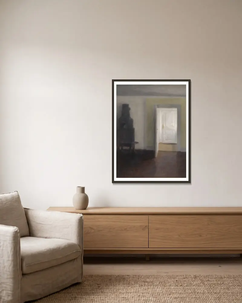 Interieur. Ein alter Ofen von Vilhelm Hammershøi gerahmt an einer Wand