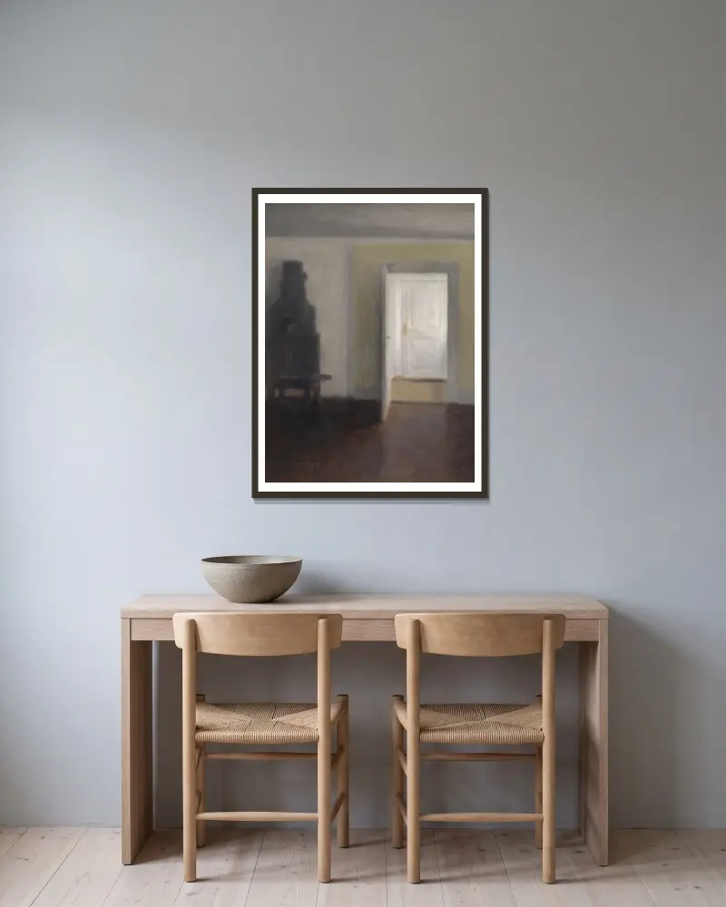 Interieur. Ein alter Ofen von Vilhelm Hammershøi gerahmt an einer Wand