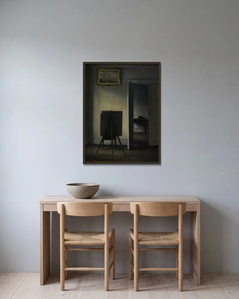 Interior with the Artist’s Easel av Vilhelm Hammershøi inramad på en vägg