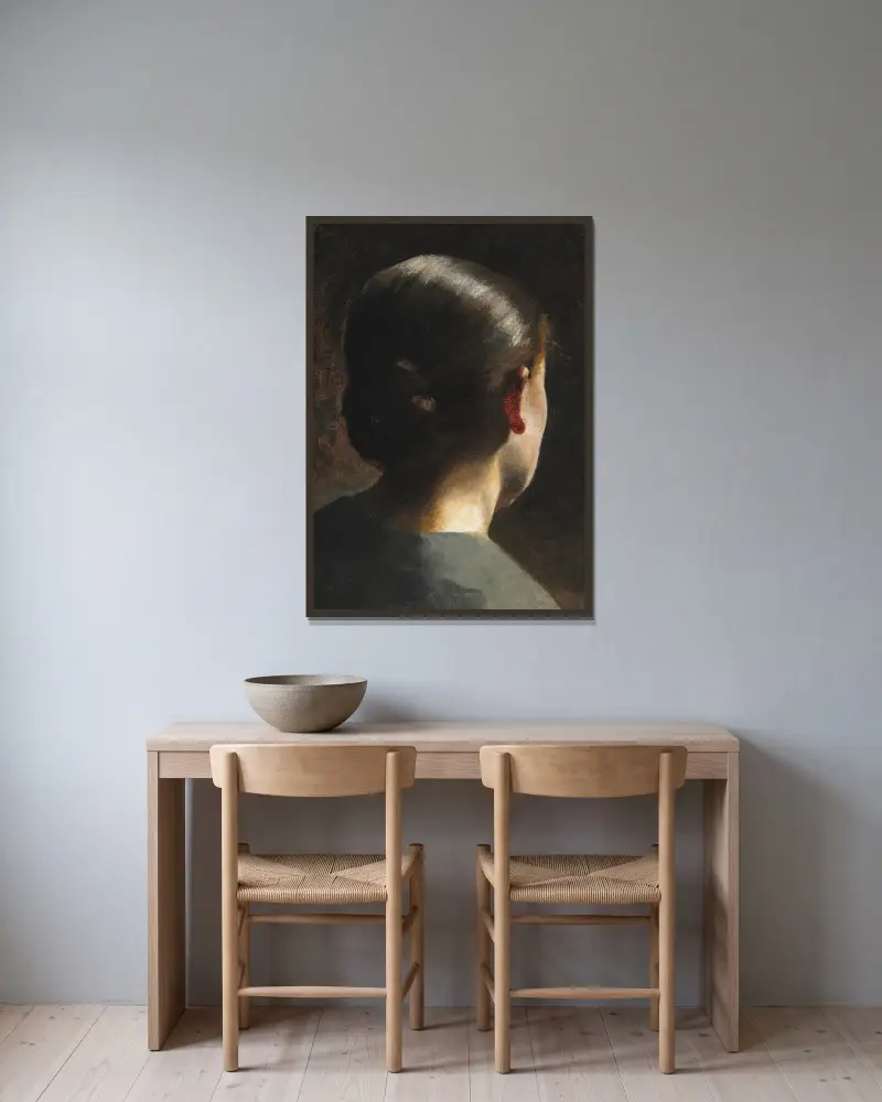 Portræt af kunstnerens søster Anna Hammershøi set bagfra av Vilhelm Hammershøi inramad på en vägg