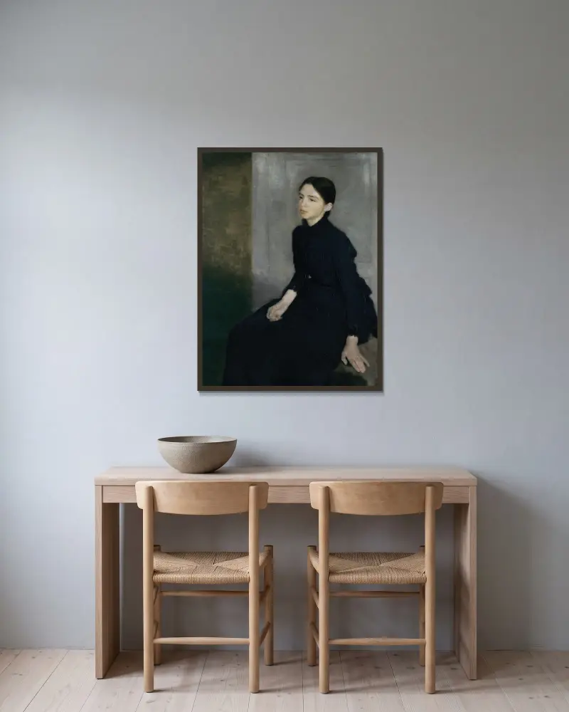 Portrait of a young woman. The artist’s sister Anna Hammershøi av Vilhelm Hammershøi inramad på en vägg