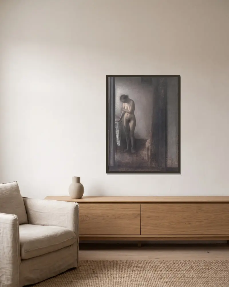 Standing Female Nude av Vilhelm Hammershøi inramad på en vägg