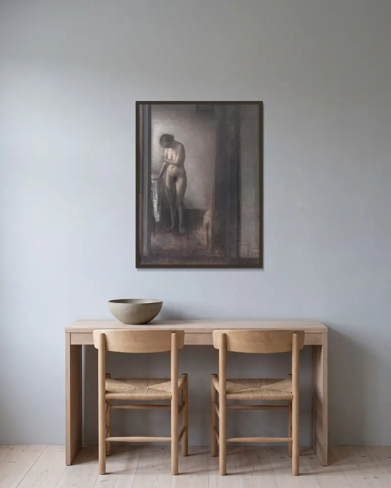 Standing Female Nude av Vilhelm Hammershøi inramad på en vägg