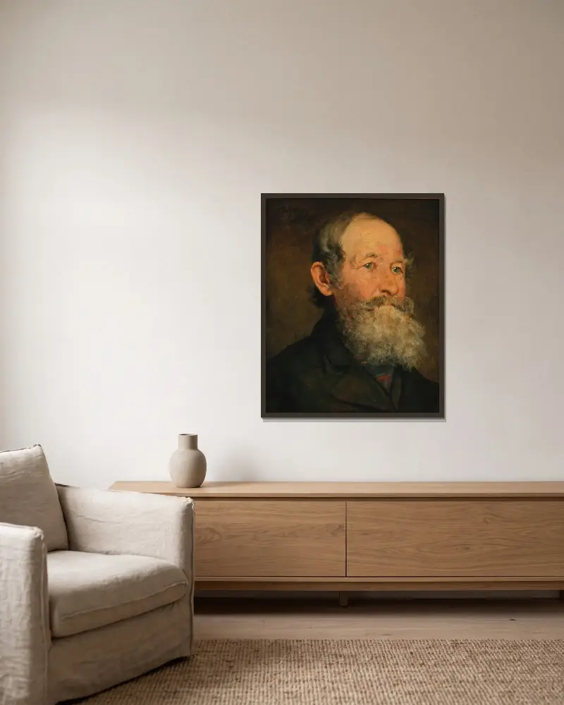 Manshuvud av Franz von Defregger inramad på en vägg