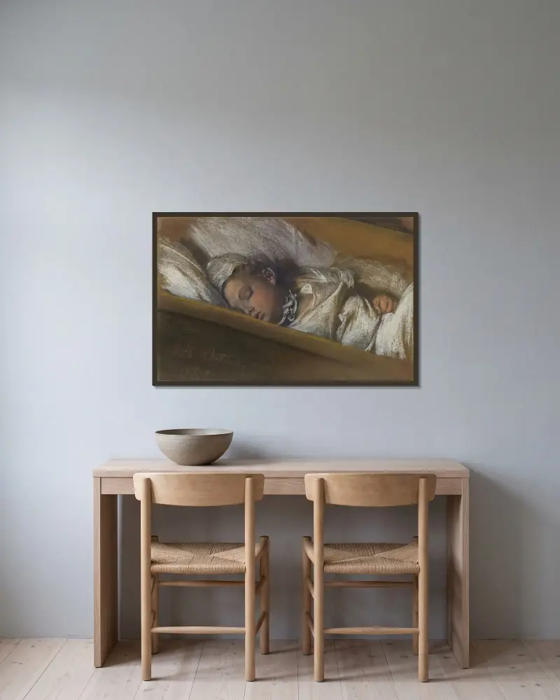 Ett sovande spädbarn i sin vagga av Adolph von Menzel inramad på en vägg