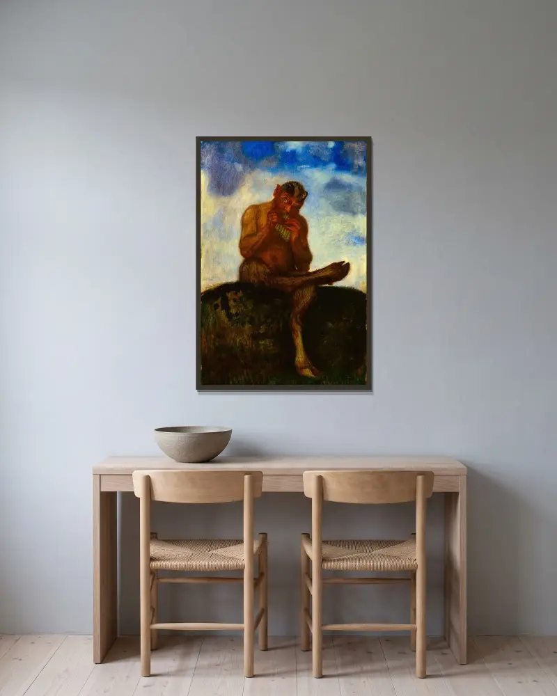 Sittande Pan med flöjt av Franz von Stuck inramad på en vägg