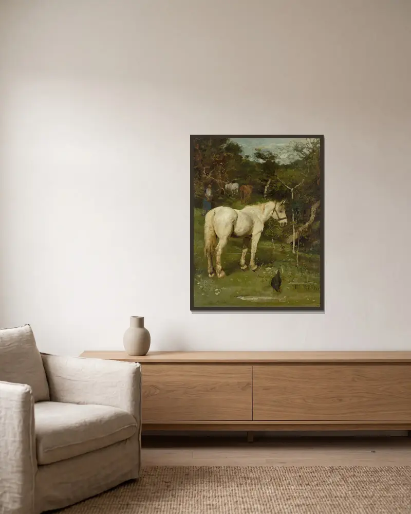 Ein weißes Pferd von Fritz von Uhde gerahmt an einer Wand