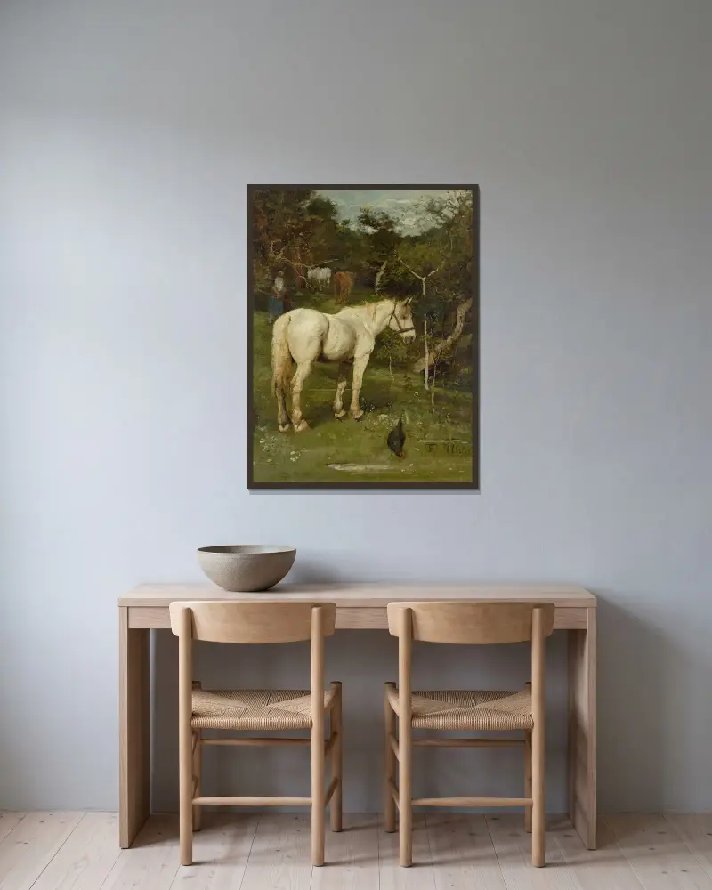 Ein weißes Pferd von Fritz von Uhde gerahmt an einer Wand