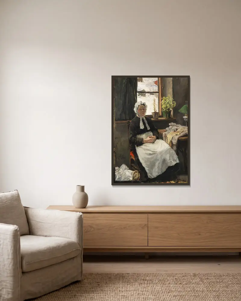 Die alte Näherin von Fritz von Uhde gerahmt an einer Wand