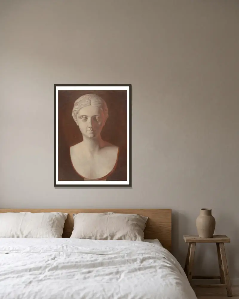 Frauenkopf von Ferdinand von Wright gerahmt an einer Wand