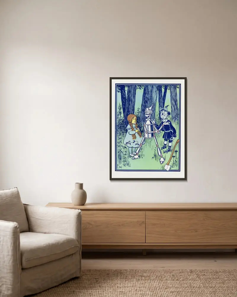 ‘This is the great comfort,’ said the Tin Woodman av William Wallace Denslow inramad på en vägg