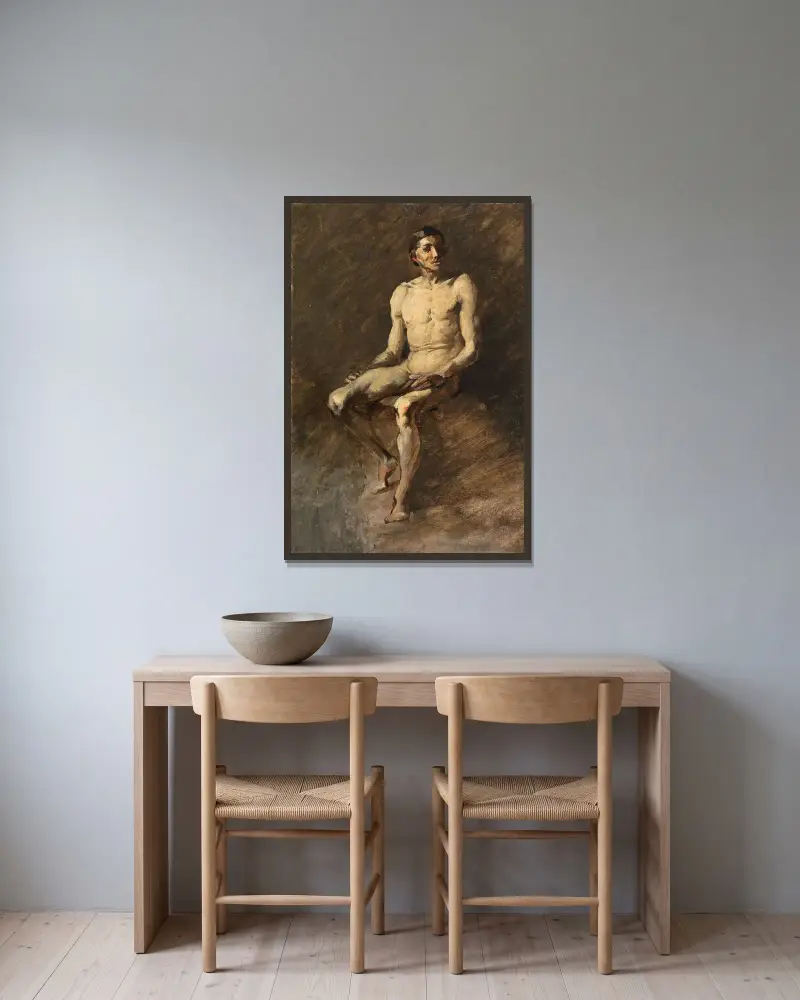 Sittande manlig akt av Wilhelm Busch inramad på en vägg