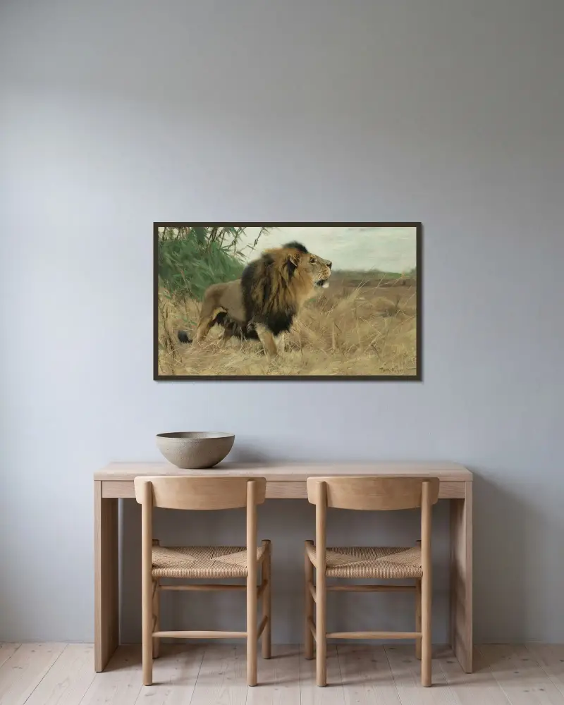 Berberlöwe von Wilhelm Kuhnert gerahmt an einer Wand