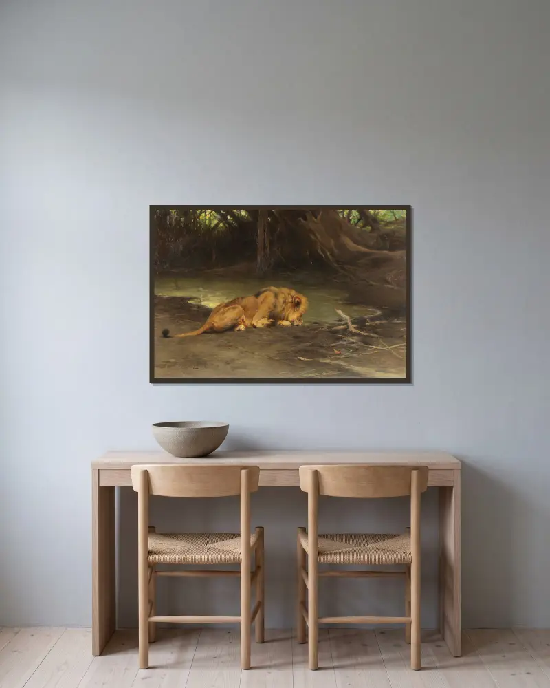 Löwe an der Tränke von Wilhelm Kuhnert gerahmt an einer Wand