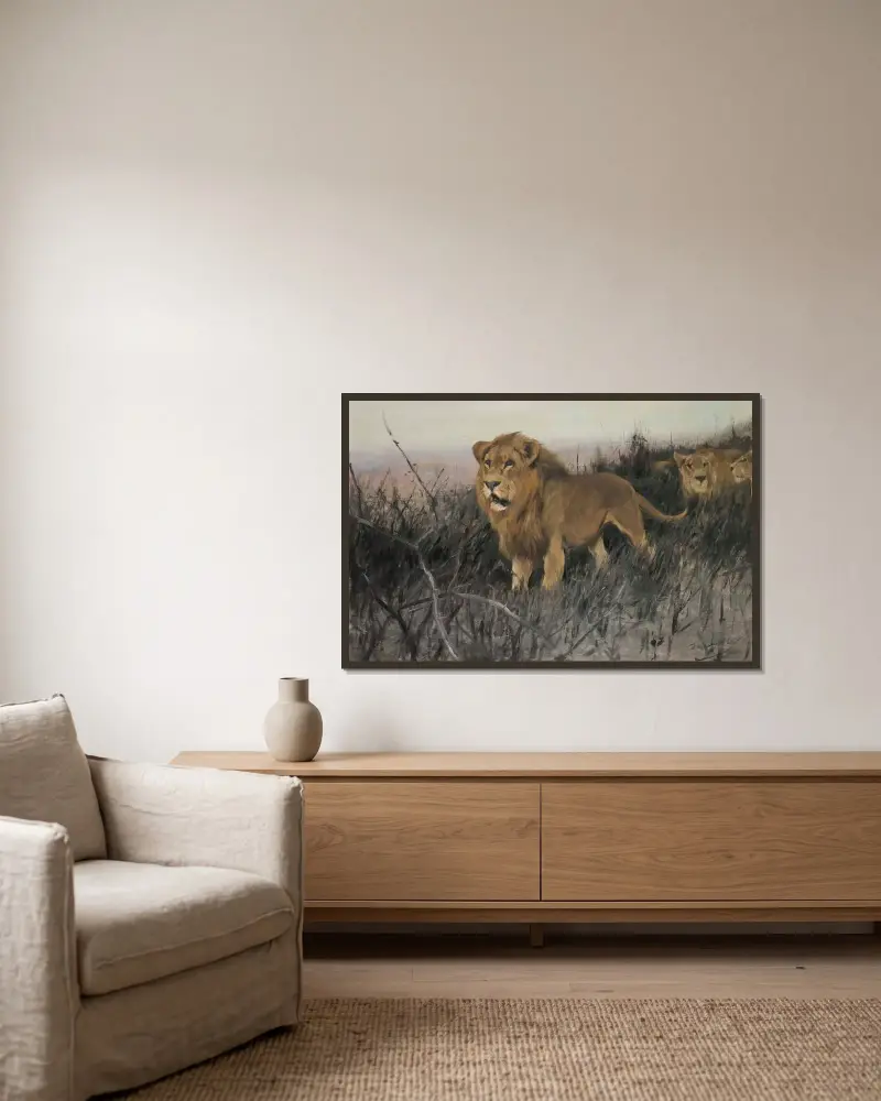 Löwen in verbrannter Steppe von Wilhelm Kuhnert gerahmt an einer Wand