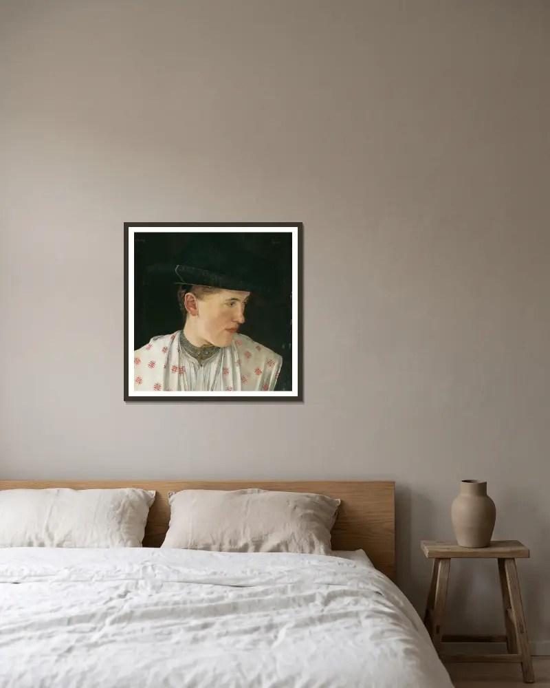 Kopf eines Bauernmädchens von Wilhelm Leibl gerahmt an einer Wand