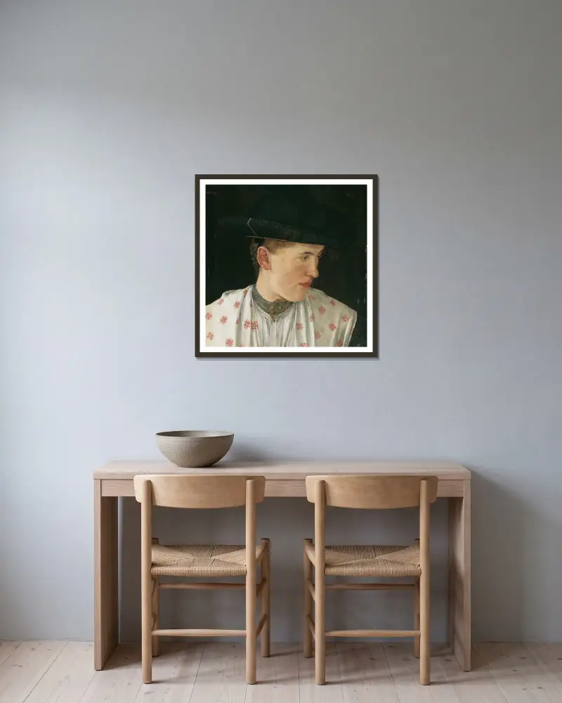 Kopf eines Bauernmädchens von Wilhelm Leibl gerahmt an einer Wand