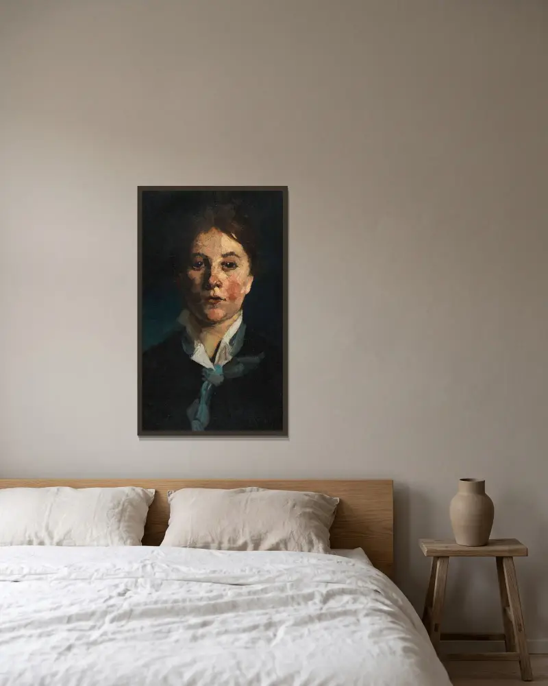 Flicka med vit krage, en face av Wilhelm Trübner inramad på en vägg