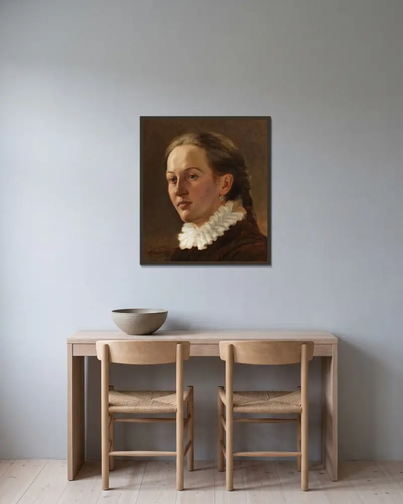 Porträtt av en ung kvinna av Wilhelm Trübner inramad på en vägg