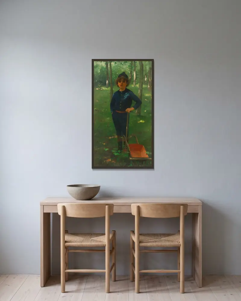 Pojke med skottkärra av Willem Witsen inramad på en vägg