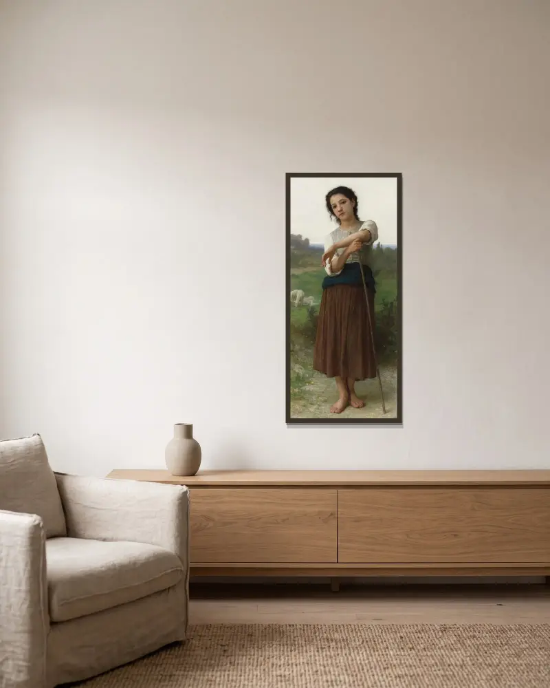 Ung herdinna stående av William Bouguereau inramad på en vägg