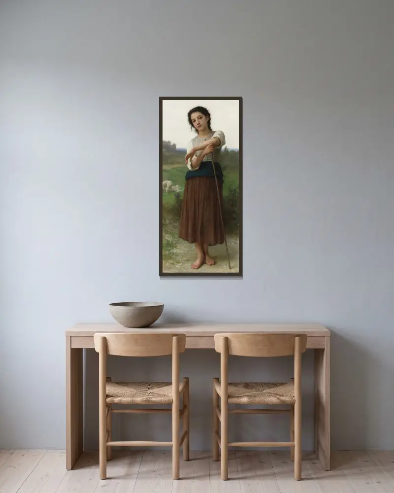 Ung herdinna stående av William Bouguereau inramad på en vägg