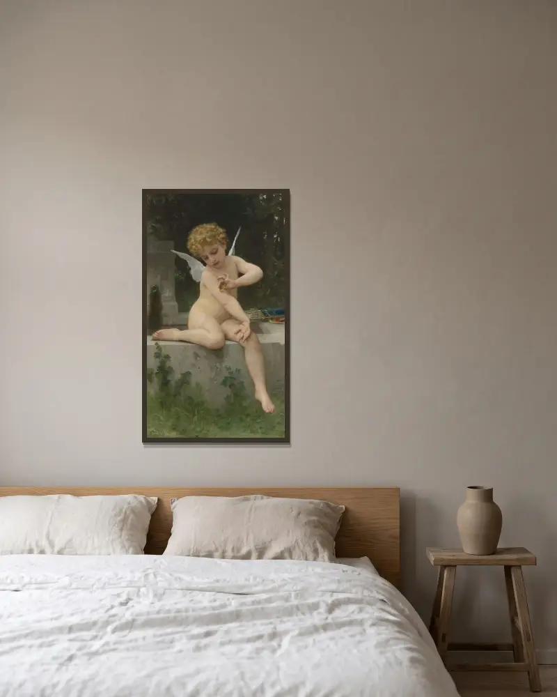 Kärlek med fjäril av William Bouguereau inramad på en vägg