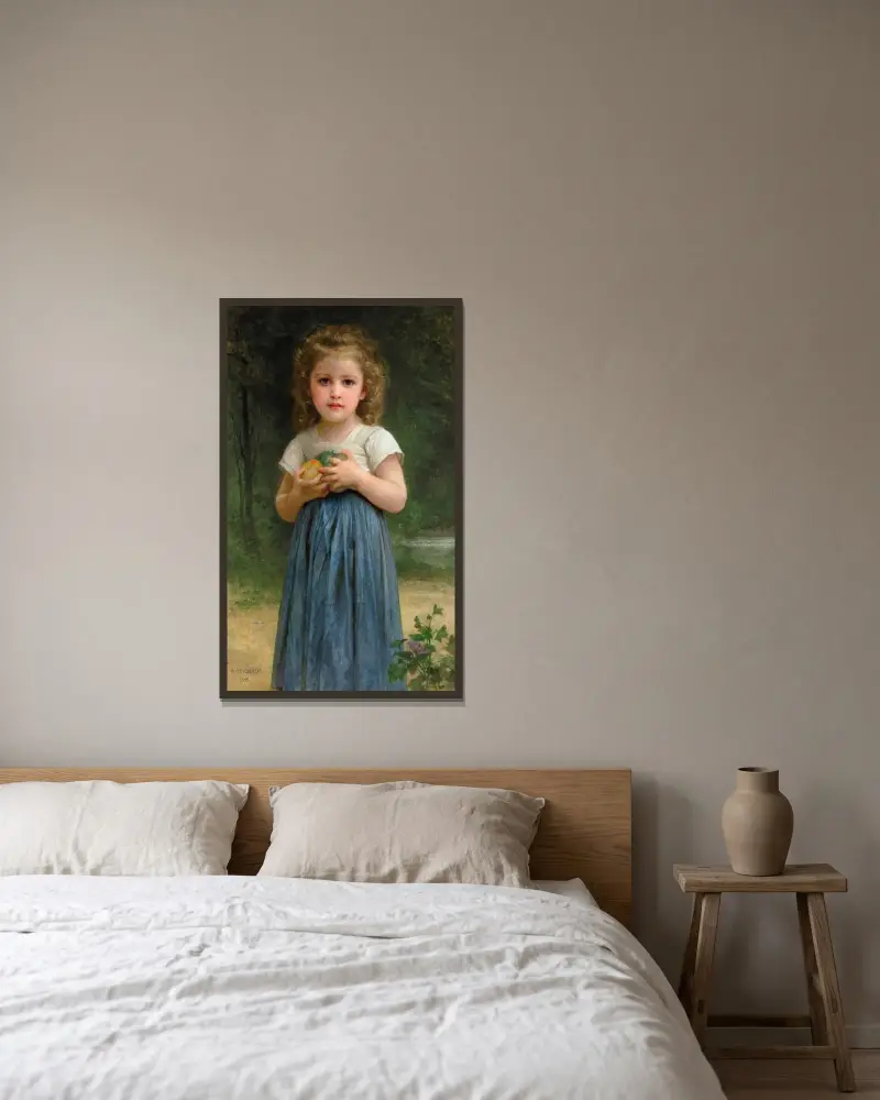 Liten flicka med äpplen i händerna av William Bouguereau inramad på en vägg