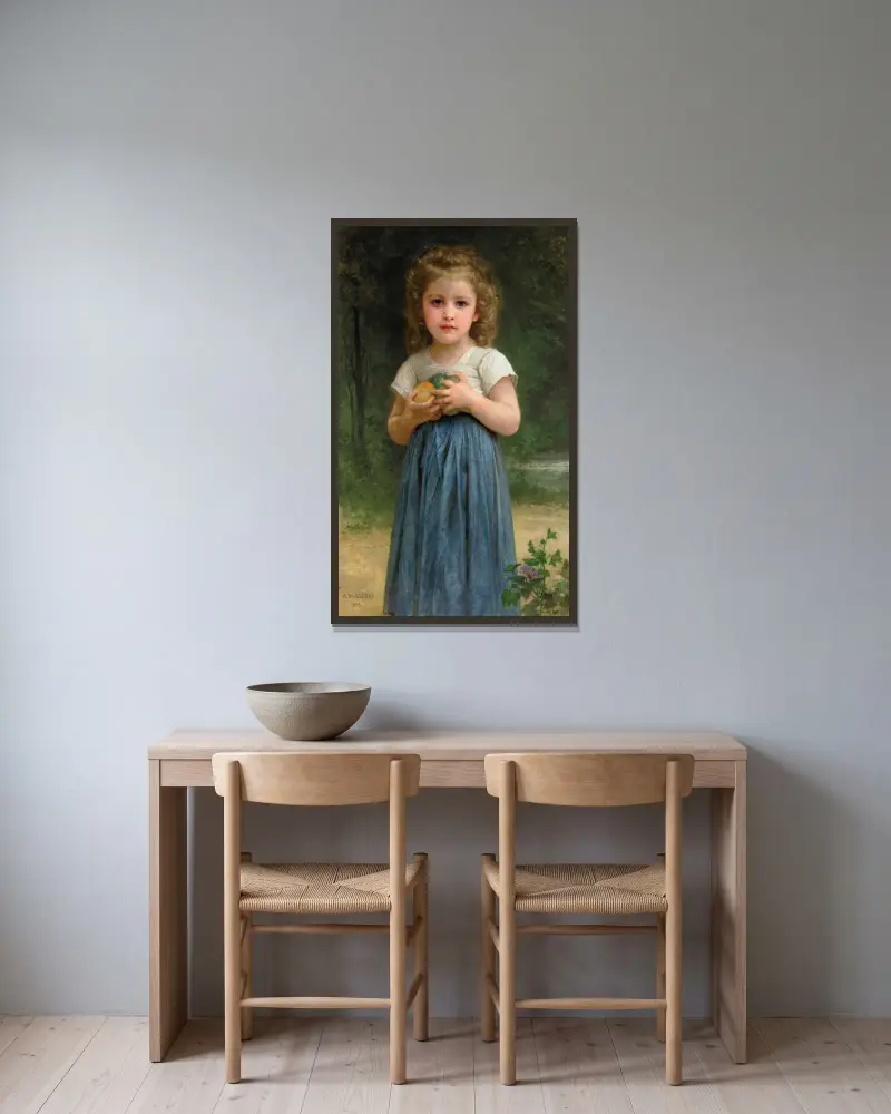 Liten flicka med äpplen i händerna av William Bouguereau inramad på en vägg
