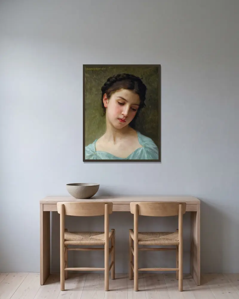 Porträtt av ung flicka av William Bouguereau inramad på en vägg