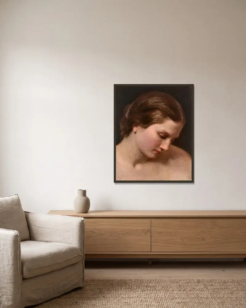 Kvinnoprofil av William Bouguereau inramad på en vägg