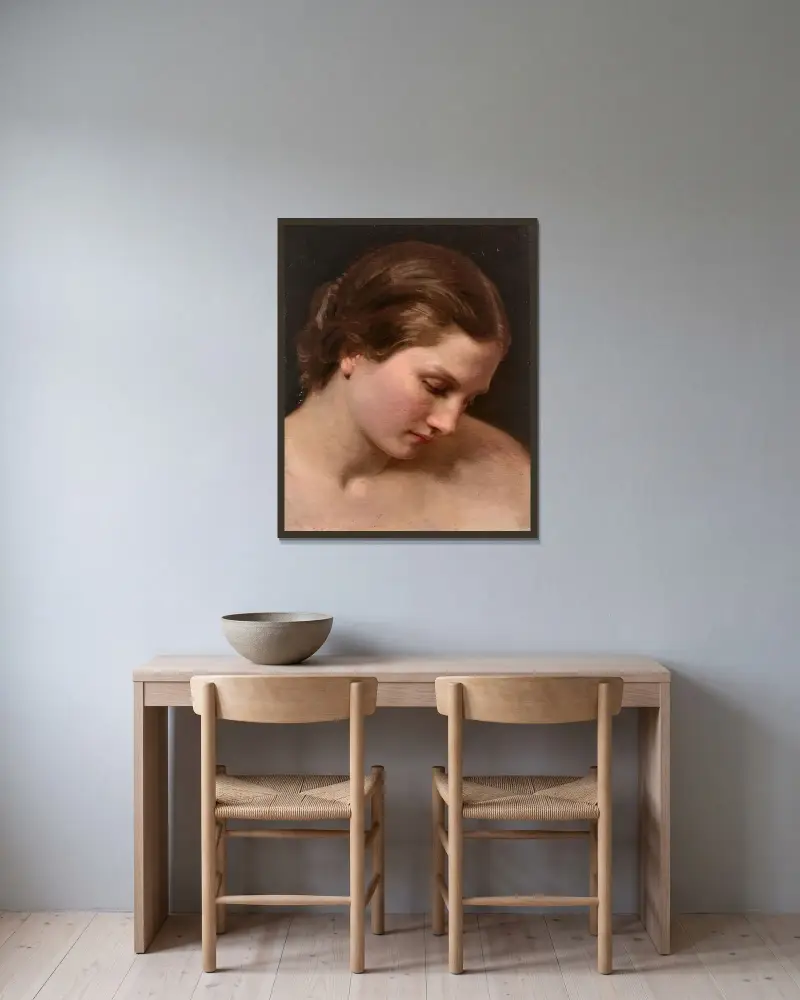 Kvinnoprofil av William Bouguereau inramad på en vägg