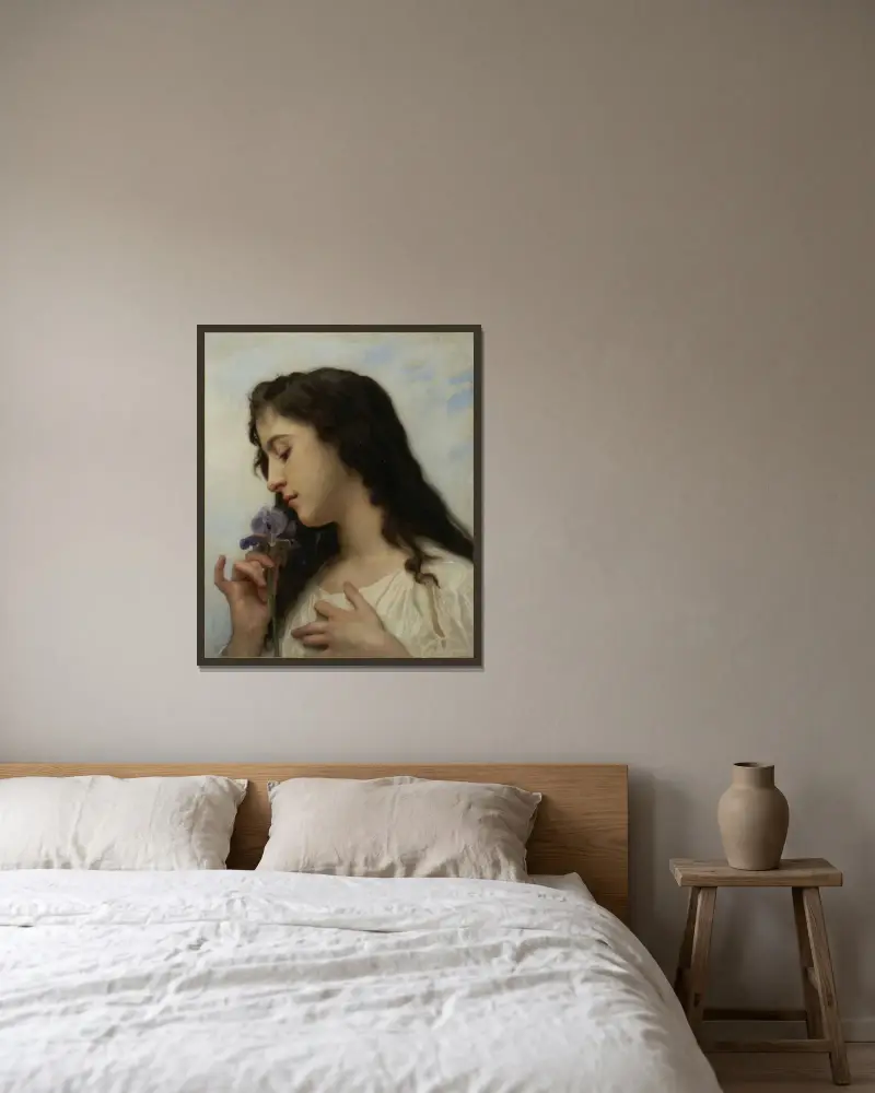 Kvinna med iris av William Bouguereau inramad på en vägg