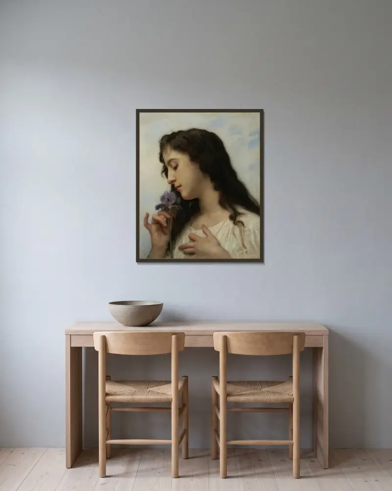 Kvinna med iris av William Bouguereau inramad på en vägg