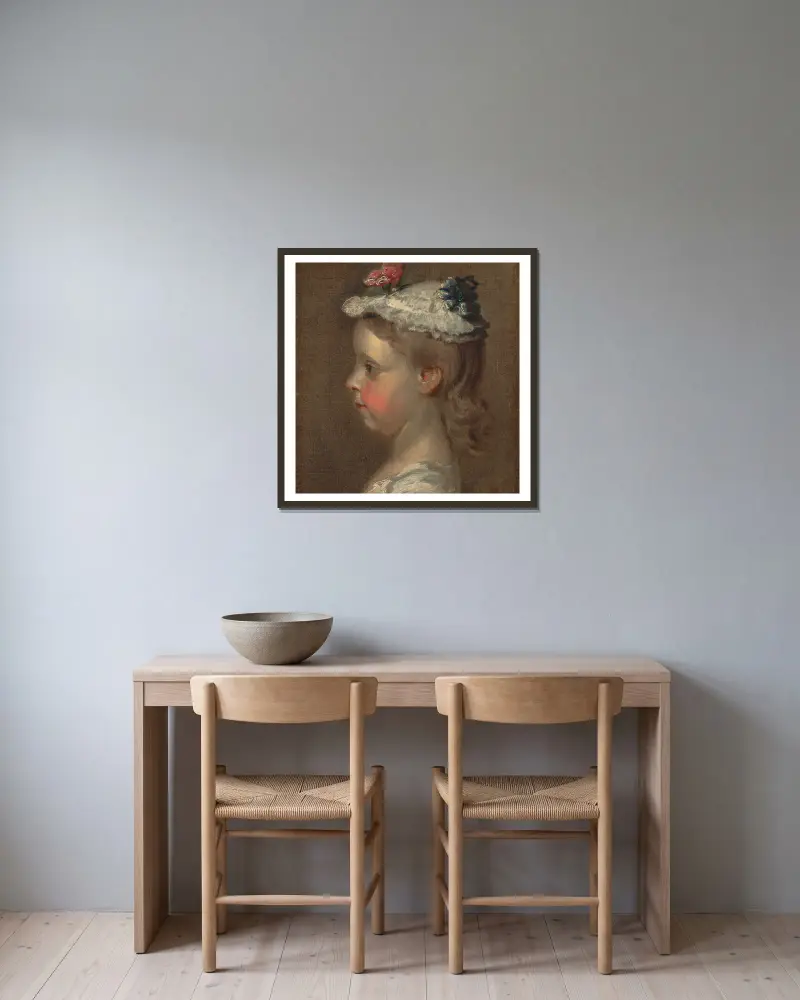 Study of a Girl’s Head av William Hogarth inramad på en vägg