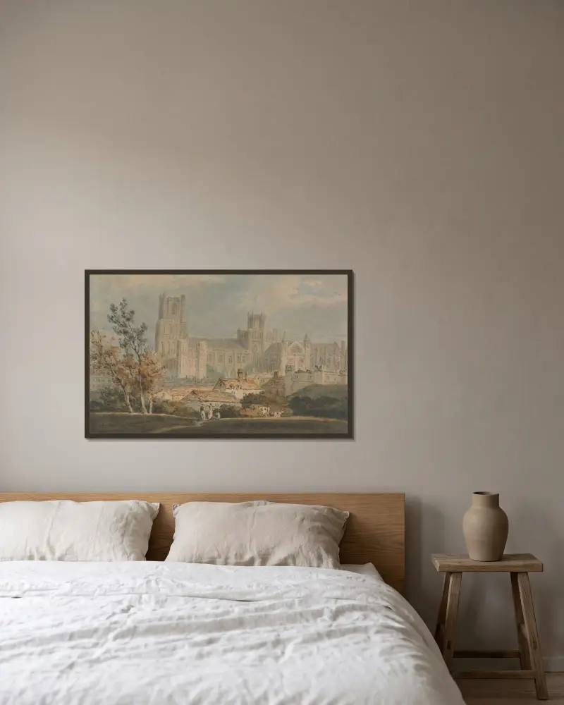 Blick auf die Kathedrale von Ely von Joseph Mallord William Turner gerahmt an einer Wand