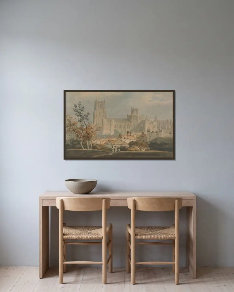 Blick auf die Kathedrale von Ely von Joseph Mallord William Turner gerahmt an einer Wand