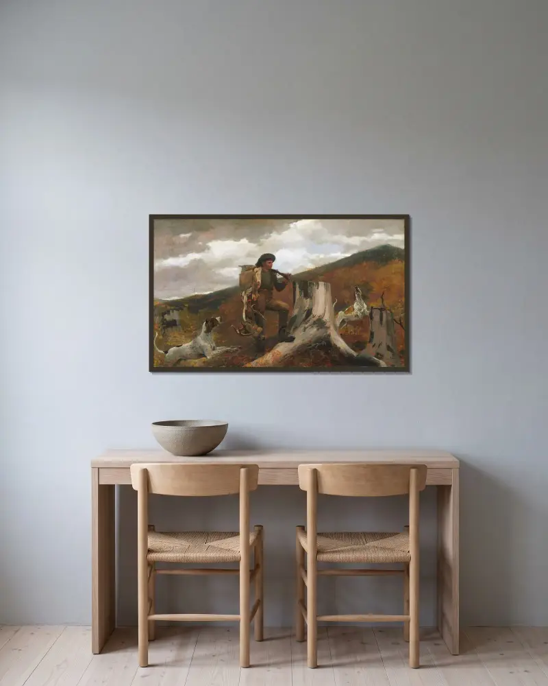 A Huntsman and Dogs av Winslow Homer inramad på en vägg
