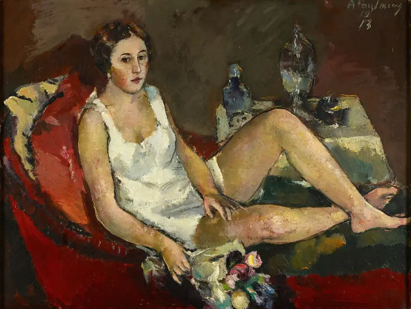 Junge Frau Auf Rotem Sofa av Anton Faistauer