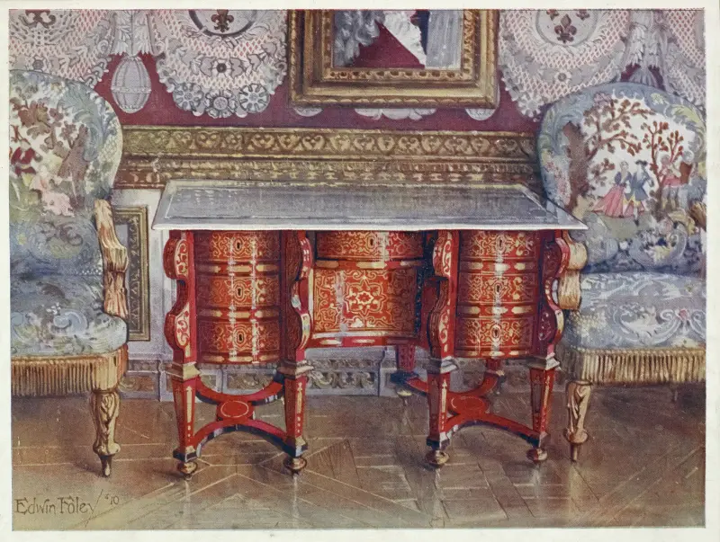 Kneehole writing table in red tortoiseshell. Lacquer steel top. Boulle. Gilt fauteuils, upholstered in tapestry av Edwin Foley