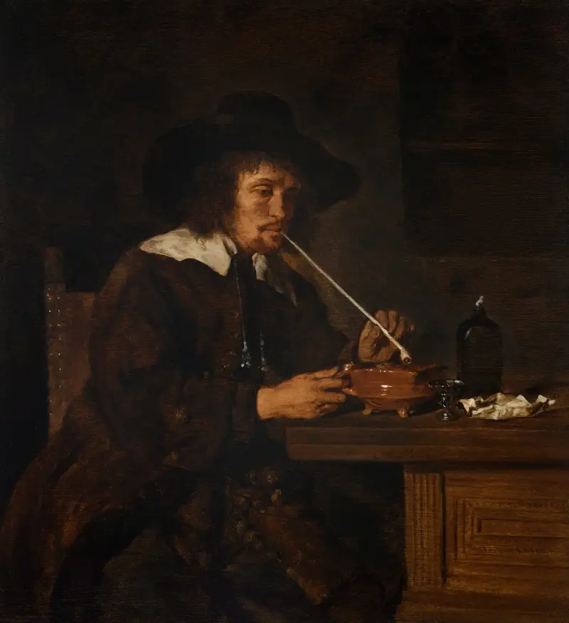 A smoker lighting his pipe av Gabriel Metsu