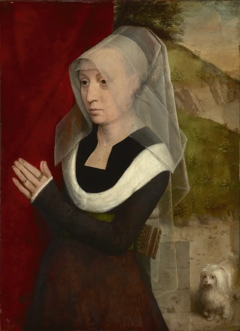 Portrait of a woman at prayer av Hans Memling