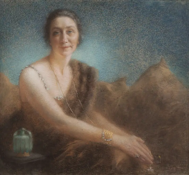 Elegante Frau auf einem Sofa von Lucien Lévy-Dhurmer