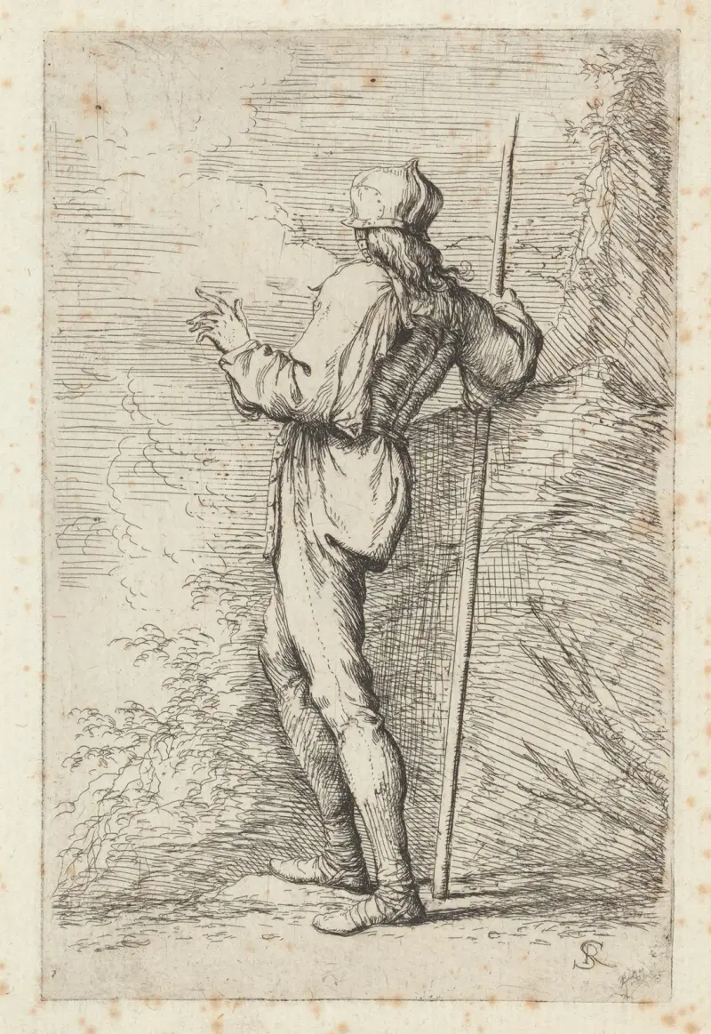 Stehender Soldat mit langem Stock vor einer Felswand von Salvator Rosa