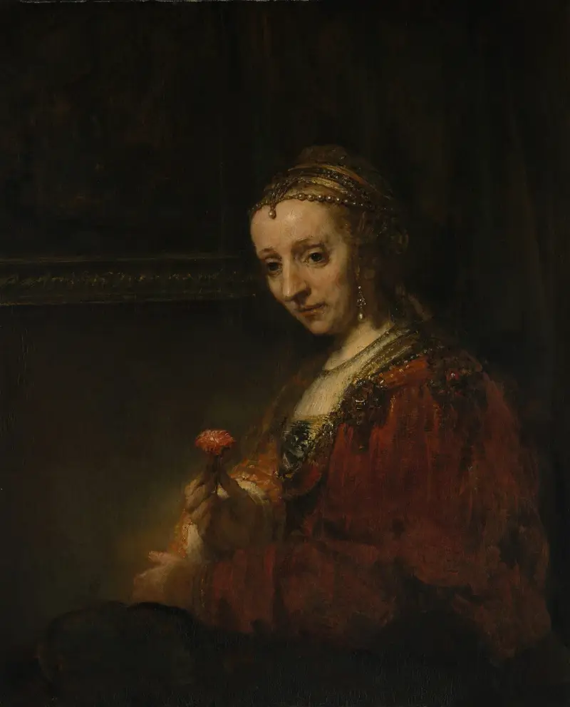 Woman with a Pink av Rembrandt van Rijn
