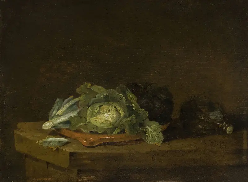 Kohl auf einer Tischplatte von Willem Kalf